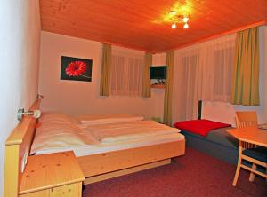Postel nebo postele na pokoji v ubytování Haus Vilgrassa