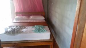 Ένα ή περισσότερα κρεβάτια σε δωμάτιο στο Green Chilli Bungalows +6 φωτογραφίες