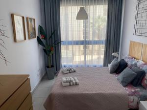 Ένα ή περισσότερα κρεβάτια σε δωμάτιο στο Calpe Beach 2 Ifach +48 φωτογραφίες