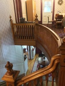 an overhead view of a wooden staircase in a house at Marmora and Lake Inn and Victorian Diner in Marmora