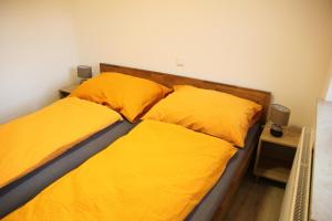 Posteľ alebo postele v izbe v ubytovaní Ferienhaus Kühlwein