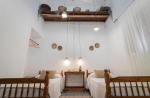 A bed or beds in a room at La Vaquería
