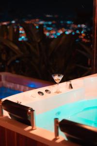 a martini glass sitting on top of a table at Waira Eco Lodge in Villavicencio