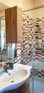 Koupelna v ubytování Pacifico Rooms