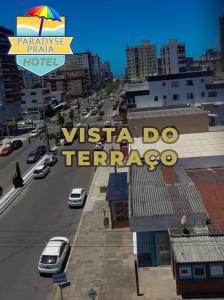 a sign for a vista do terrazo on a city street at Hotel Paradyse Praia in Capão da Canoa