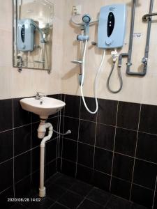 Koupelna v ubytování TAMIM SUITE GROUP HOTEL Dungun
