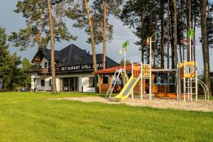Detský kútik v ubytovaní Apartamenty Wakacyjna Wioska Ngô 20m od Suntago