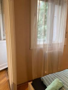 Posteľ alebo postele v izbe v ubytovaní Roland Apartment Downtown - Pozsonyi