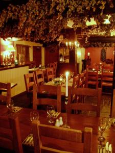 A restaurant or other place to eat at The Chequers Inn 