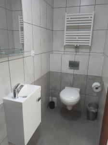 Koupelna v ubytování Wschodzące Słońce