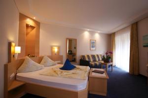 Postel nebo postele na pokoji v ubytování Hotel Elisabeth + 37 fotografií