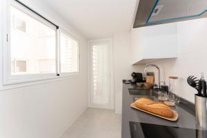 Kuchyň nebo kuchyňský kout v ubytování Apartamento de lujo de un dormitorio + 1 fotografie