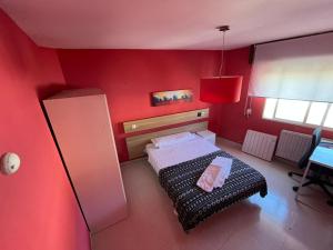 Łóżko lub łóżka w pokoju w obiekcie Residencia Vista Alegre