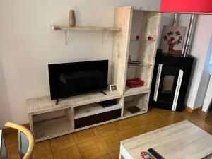 Telewizja i/lub zestaw kina domowego w obiekcie Residencia Vista Alegre