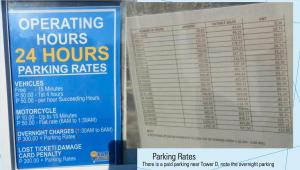 a sign for organizing hours hours parking rates at Shore Residences Tower D (Condo Unit ShoreWorknPlay) in Manila