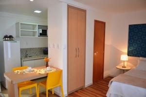 Postel nebo postele na pokoji v ubytování Unico Apart Hotel