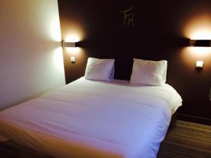 Postel nebo postele na pokoji v ubytování Fasthotel Dunkerque