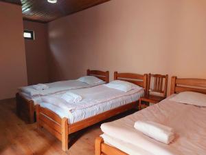 Katil atau katil-katil dalam bilik di Guesthouse and Cottage Nicolo