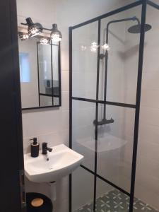 Kúpeľňa v ubytovaní Apartmány Oxota