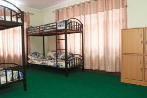 Letto o letti in una camera di Kathway Hostel & Homestay