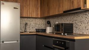 Kuchyň nebo kuchyňský kout v ubytování HILLTOP apartments Skopje + 6 fotografií