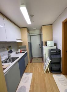 Cuina o zona de cuina de Hongdae Residence 3 - 1min from Hongik Uni station Exit #1