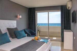 Postel nebo postele na pokoji v ubytování Hotel Byzance