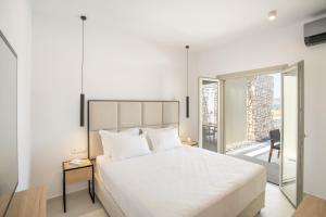 Posteľ alebo postele v izbe v ubytovaní T7 LUXURY VILLAS PAROS