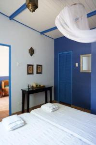 Postel nebo postele na pokoji v ubytování Caribbean Chillout Apartments