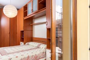 A bed or beds in a room at CASA ANGELA