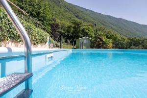 The swimming pool at or close to CASA ANGELA