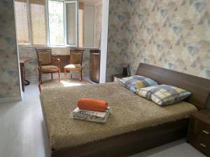 Кровать или кровати в номере Guldana