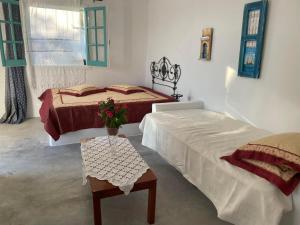 Posteľ alebo postele v izbe v ubytovaní Sweet home with two beds -one single room- with beautiful view!