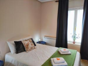 Posteľ alebo postele v izbe v ubytovaní Apartamento Itsasoa Barrika