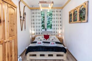 Llit o llits en una habitació de Sabałowe Bajania