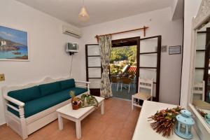 Area tempat duduk di Hovolo Hotel Apartments