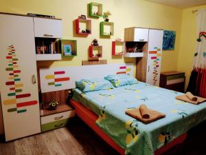 a bedroom with a bed in a room with at Guest house near Varna in Varna City