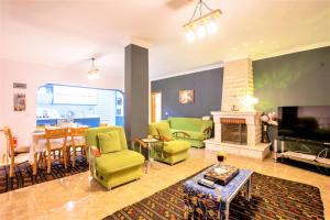 โทรทัศน์และ/หรือระบบความบันเทิงของ Villa Grando 1