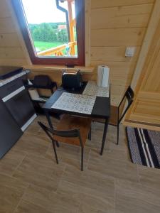 Fotografia z galérie ubytovania Domki z bali u Ireny Mazury v destinácii Ryn