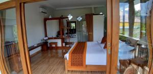 The Aroma Villa Munduk客房内的一张或多张床位