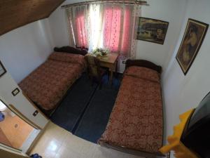 Posteľ alebo postele v izbe v ubytovaní Hotel Ideal
