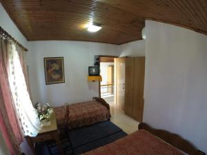 Posteľ alebo postele v izbe v ubytovaní Hotel Ideal