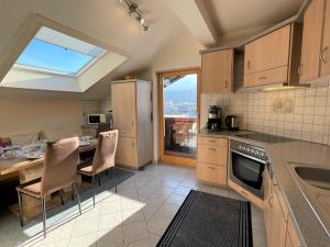 A kitchen or kitchenette at Apartment Fill by Interhome