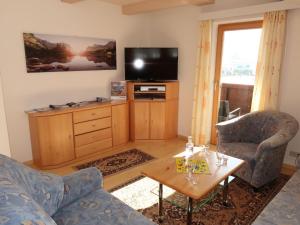 A television and/or entertainment centre at Apartment Fill by Interhome