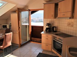 A kitchen or kitchenette at Apartment Fill by Interhome