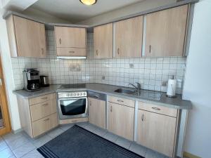 A kitchen or kitchenette at Apartment Fill by Interhome