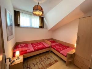 A bed or beds in a room at Apartment Fill by Interhome