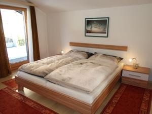 A bed or beds in a room at Apartment Fill by Interhome