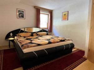 A bed or beds in a room at Apartment Fill by Interhome