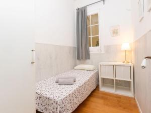 Posteľ alebo postele v izbe v ubytovaní Apartment Gracia Torrijos by Interhome